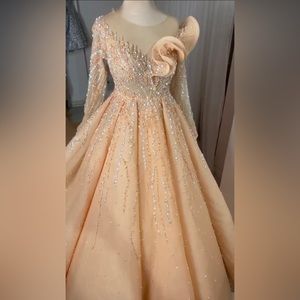 Creamy Peach Princess Gown embellished with pearls